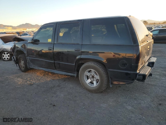 2000 Chevrolet Tahoe Limited with VIN 1GNEC13R5YR162329, listed as a Copart auction lot 84117434 with 177,241 mi miles and Salvage Title. Bid and sale history available at carsss.com. Image 2.