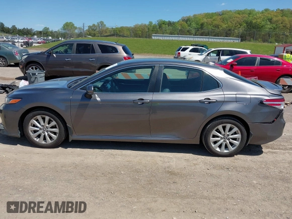 2019 Toyota Camry LE with VIN 4T1B11HK8KU289721, listed as a IAAI auction lot 42021107 with 69,828 mi miles and . Bid and sale history available at DreamBid. Image 14.