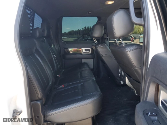 2013 Ford F-150 XLT with VIN 1FTFW1E65DFA84587, listed as a Copart auction lot 69295264 with 216,967 mi miles and Salvage Title. Bid and sale history available at carsss.com. Image 10.
