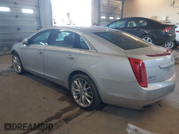 2013 Cadillac XTS Platinum with VIN 2G61V5S31D9190738, listed as a IAAI auction lot 41657461 with 136,924 mi miles and . Bid and sale history available at carsss.com. Image 3.