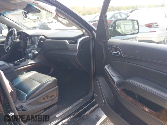 2018 Chevrolet Tahoe LT with VIN 1GNSKBKC7JR245565, listed as a IAAI auction lot 42097400 with 123,709 mi miles and . Bid and sale history available at DreamBid. Image 5.