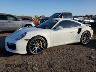 2018 Porsche 911 Turbo z VIN WP0AD2A91JS156233, wystawiony jako Copart lot #75601324 z przebiegiem 13 202 mil mil oraz Szkoda całkowita • Salvage title. Historia ofert i sprzedaży dostępna na DreamBid. Obrazek 1.