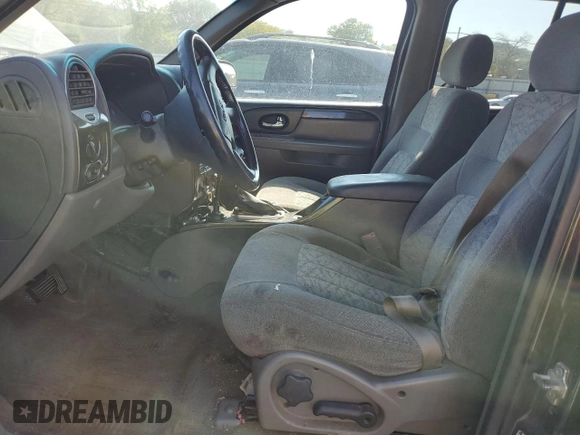 2004 GMC Envoy SLT with VIN 1GKDT13SX42423677, listed as a Copart auction lot 69012884 with Not Provided miles and Clean Title. Bid and sale history available at carsss.com. Image 7.