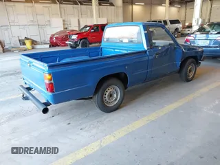 1985 Toyota Pickup z VIN JT4RN50RXF0083921, wystawiony jako IAAI lot #42029838 z przebiegiem 249 994 mil mil oraz . Historia ofert i sprzedaży dostępna na DreamBid. Obrazek 4.
