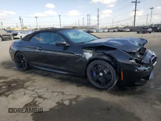 2016 BMW M6 z VIN WBS6G9C57GD932144, wystawiony jako Copart lot #72273744 z przebiegiem 71 614 mil mil oraz Szkoda całkowita • Salvage title. Historia ofert i sprzedaży dostępna na DreamBid. Obrazek 4.