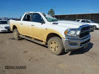 2019 Ram 2500 Lone Star with VIN 3C6UR5DL1KG663656, listed as a IAAI auction lot 41329641 with 124,361 mi miles and . Bid and sale history available at DreamBid. Image 1.