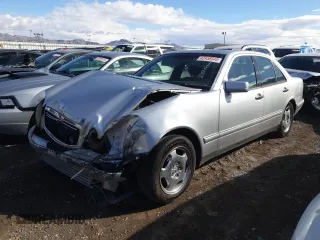 1998 Mercedes-Benz E with VIN WDBJF70F7WA605103, listed as a Copart auction lot 42458545 with 189,082 mi miles and Salvage Title. Bid and sale history available at DreamBid. Image 1.