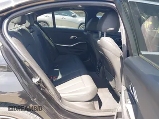 2019 BMW 3 Series 330i with VIN WBA5R1C51KFH09402, listed as a IAAI auction lot 41869138 with 59,115 mi miles and . Bid and sale history available at DreamBid. Image 8.