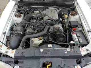 1997 Ford Mustang with VIN 1FALP4046VF180467, listed as a Copart auction lot 60754265 with 154,676 mi miles and Salvage title. Bid and sale history available at DreamBid. Image 11.