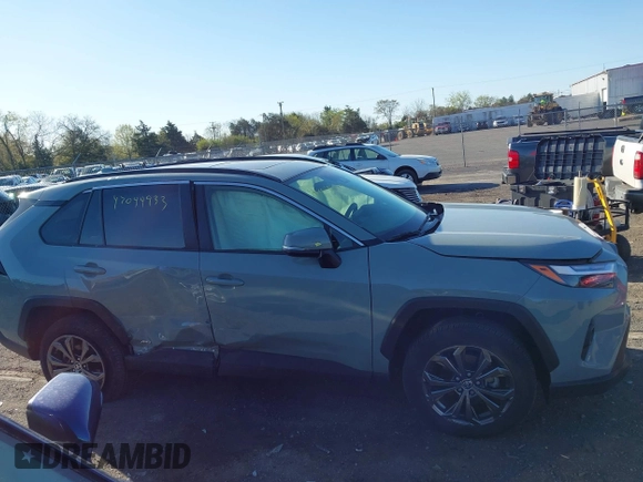 2023 Toyota RAV4 Hybrid XLE Premium with VIN JTMB6RFV3PD116696, listed as a IAAI auction lot 42044933 with 18,553 mi miles. Bid and sale history available at carsss.com. Image 13.
