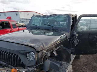 2014 Jeep Wrangler Sahara with VIN 1C4AJWBG5EL247812, listed as a IAAI auction lot 40909884 with 106,475 mi miles and . Bid and sale history available at DreamBid. Image 6.