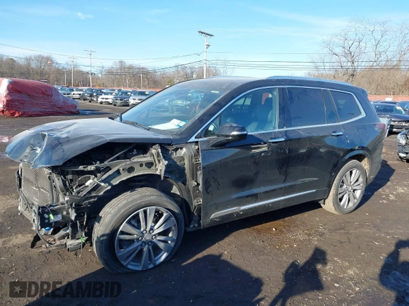 2023 Cadillac XT6 FWD Premium Luxury with VIN 1GYKPCRS1PZ105964, listed as a IAAI auction lot 41525039 with 70,603 mi miles and . Bid and sale history available at DreamBid. Image 19.