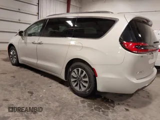 2021 Chrysler Pacifica Touring L with VIN 2C4RC1BG7MR531772, listed as a IAAI auction lot 41834392 with 156,123 mi miles and . Bid and sale history available at DreamBid. Image 3.