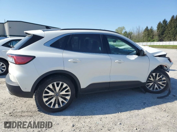 2020 Ford Escape Titanium Hybrid z VIN 1FMCU9DZ4LUC12763, wystawiony jako Copart lot #56589615 z przebiegiem Nie podano mil oraz Szkoda całkowita • Salvage title. Historia ofert i sprzedaży dostępna na DreamBid. Obrazek 3.