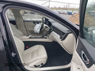 2019 Volvo S60 Momentum with VIN 7JRA22TK5KG018383, listed as a IAAI auction lot 42146289 with 111,227 mi miles. Bid and sale history available at carsss.com. Image 5.