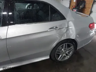 2015 Mercedes-Benz E-Class E 350 Luxury with VIN WDDHF8JB7FB140906, listed as a IAAI auction lot 41616225 with 137,859 mi miles. Bid and sale history available at carsss.com. Image 6.