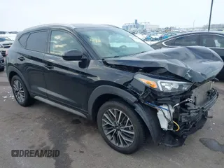 2020 Hyundai Tucson SEL z VIN KM8J3CAL9LU178729, wystawiony jako IAAI lot #41146892 z przebiegiem 91 705 mil mil oraz . Historia ofert i sprzedaży dostępna na DreamBid. Obrazek 1.