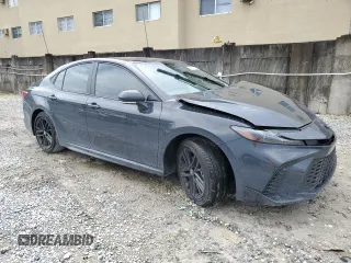 2025 Toyota Camry LE with VIN 4T1DAACK8SU580753, listed as a Copart auction lot 52051845 with 1,411 mi miles and Salvage Title. Bid and sale history available at carsss.com. Image 4.