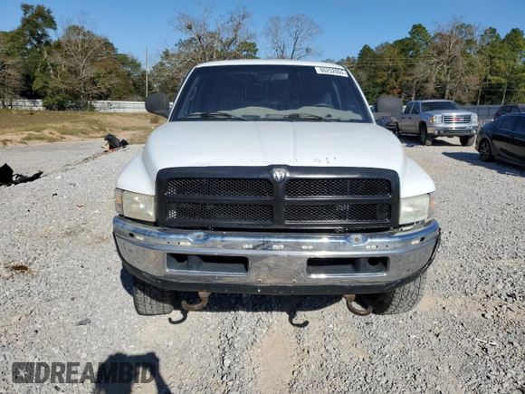 1999 Dodge 2500 with VIN 1B7KF23Z6XJ558288, listed as a Copart auction lot 86252004 with 251,023 mi miles and Salvage title. Bid and sale history available at DreamBid. Image 5.