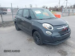 2014 FIAT 500L Easy with VIN ZFBCFABH1EZ011485, listed as a IAAI auction lot 41598470 with 69,036 mi miles and . Bid and sale history available at DreamBid. Image 1.