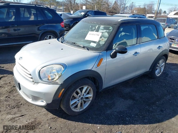2012 MINI Cooper Countryman with VIN WMWZB3C50CWM04795, listed as a IAAI auction lot 41414790 with NaN miles. Bid and sale history available at carsss.com. Image 2.