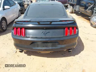 2017 Ford Mustang V6 z VIN 1FA6P8AM5H5256208, wystawiony jako IAAI lot #42069664 z przebiegiem 82 427 mil mil oraz . Historia ofert i sprzedaży dostępna na DreamBid. Obrazek 16.