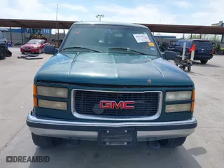 1998 GMC Suburban with VIN 1GKGK26J4WJ734958, listed as a IAAI auction lot 41878070 with 131,528 mi miles. Bid and sale history available at carsss.com. Image 12.