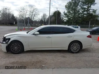 2015 Infiniti Q70 with VIN JN1BY1PP5FM601628, listed as a IAAI auction lot 41510075 with 102,363 mi miles and . Bid and sale history available at DreamBid. Image 14.