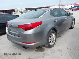 2013 Kia Optima EX z VIN 5XXGN4A73DG127493, wystawiony jako IAAI lot #42370932 z przebiegiem 173 412 mil mil oraz . Historia ofert i sprzedaży dostępna na DreamBid. Obrazek 4.