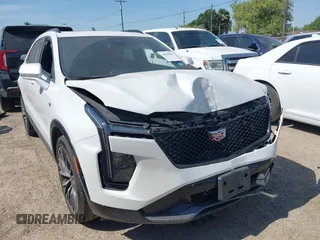 2024 Cadillac XT4 FWD Sport with VIN 1GYFZER43RF133293, listed as a IAAI auction lot 42055906 with 25,398 mi miles and . Bid and sale history available at DreamBid. Image 1.