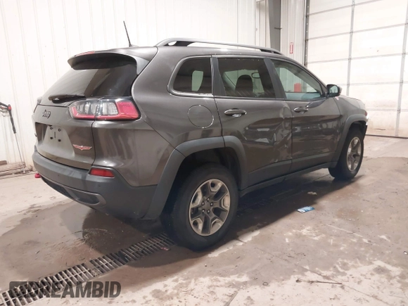2019 Jeep Cherokee Trailhawk Elite with VIN 1C4PJMBX8KD298807, listed as a IAAI auction lot 41107062 with 79,685 mi miles. Bid and sale history available at carsss.com. Image 4.