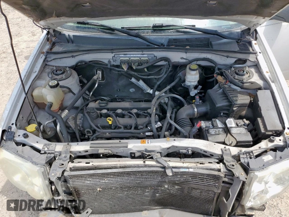 2011 Ford Escape XLT z VIN 1FMCU9D77BKB26159, wystawiony jako Copart lot #59211745 z przebiegiem 252 374 mil mil oraz Szkoda całkowita • Salvage title. Historia ofert i sprzedaży dostępna na DreamBid. Obrazek 11.