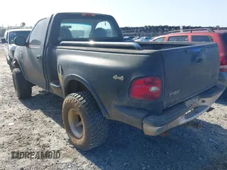 1997 Ford F-150 with VIN 1FTDF0864VKD06980, listed as a IAAI auction lot 42230820 with 174,174 mi miles and . Bid and sale history available at DreamBid. Image 3.