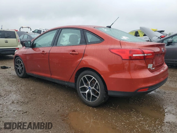 2018 Ford Focus SE with VIN 1FADP3FE6JL276125, listed as a Copart auction lot 59358325 with 155,208 mi miles and Salvage title. Bid and sale history available at DreamBid. Image 2.