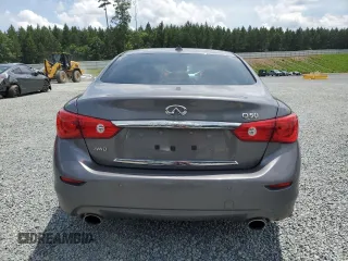 2014 Infiniti Q50 Sport with VIN JN1BV7AR4EM702521, listed as a Copart auction lot 61017205 with 61,317 mi miles and Salvage title. Bid and sale history available at DreamBid. Image 6.