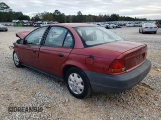 1999 Saturn SL with VIN 1G8ZH5288XZ201788, listed as a Copart auction lot 88923435 with 196,148 mi miles and Salvage Title. Bid and sale history available at carsss.com. Image 2.