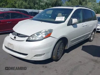 2010 Toyota Sienna XLE with VIN 5TDYK4CC3AS294129, listed as a IAAI auction lot 42510201 with 200,601 mi miles and . Bid and sale history available at DreamBid. Image 2.