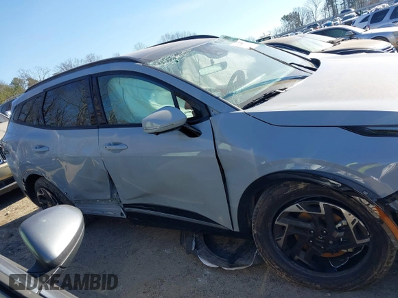 2023 Kia Sportage SX-Prestige z VIN 5XYK53AF7PG133325, wystawiony jako IAAI lot #41278082 z przebiegiem 26 361 mil mil oraz . Historia ofert i sprzedaży dostępna na DreamBid. Obrazek 13.