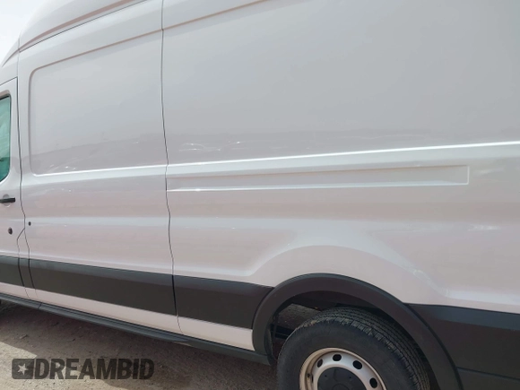 2023 Ford Transit Cargo z VIN 1FTBR3X83PKA69906, wystawiony jako IAAI lot #41755937 z przebiegiem 35 484 mil mil oraz . Historia ofert i sprzedaży dostępna na DreamBid. Obrazek 14.