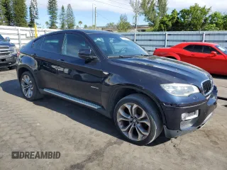2013 BMW X6 xDrive35i z VIN 5UXFG2C50DL785065, wystawiony jako Copart lot #57036985 z przebiegiem 135 515 mil mil oraz Tytuł czysty. Historia ofert i sprzedaży dostępna na DreamBid. Obrazek 4.