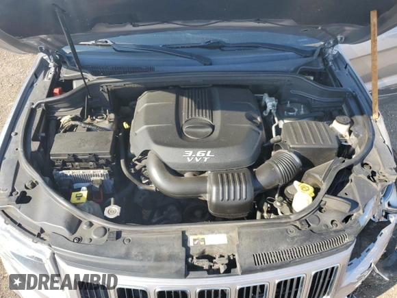 2014 Jeep Grand Cherokee Limited z VIN 1C4RJFBG7EC204799, wystawiony jako Copart lot #62458805 z przebiegiem 126 966 mil mil oraz Szkoda całkowita • Salvage title. Historia ofert i sprzedaży dostępna na DreamBid. Obrazek 12.