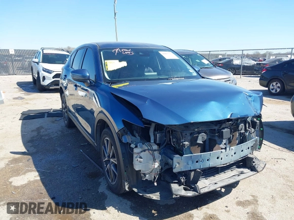2018 Mazda CX-5 Touring with VIN JM3KFBCM0J0302916, listed as a IAAI auction lot 41837733 with 100,765 mi miles. Bid and sale history available at carsss.com. Image 1.