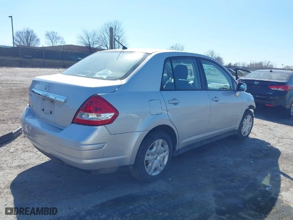 2010 Nissan Versa 1.8 S with VIN 3N1BC1AP3AL433918, listed as a IAAI auction lot 41764609 with NaN miles. Bid and sale history available at carsss.com. Image 4.