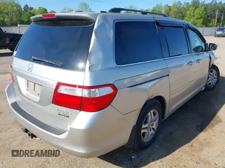 2005 Honda Odyssey EX-L z VIN 5FNRL38715B014905, wystawiony jako IAAI lot #41986395 z przebiegiem 191 029 mil mil oraz . Historia ofert i sprzedaży dostępna na DreamBid. Obrazek 19.