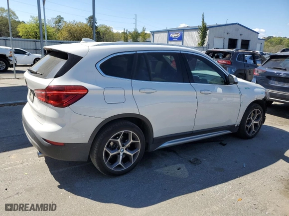 2018 BMW X1 sDrive28i with VIN WBXHU7C31J5L06010, listed as a Copart auction lot 50690995 with 44,092 mi miles and Salvage Title. Bid and sale history available at carsss.com. Image 3.