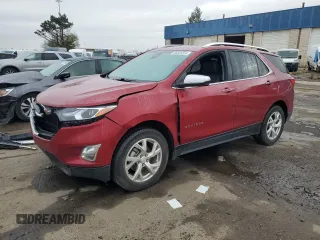 2021 Chevrolet Equinox Premier z VIN 2GNAXXEVXM6154393, wystawiony jako Copart lot #80384554 z przebiegiem 71 965 mil mil oraz Czysty tytuł • Clean title. Historia ofert i sprzedaży dostępna na DreamBid. Obrazek 1.