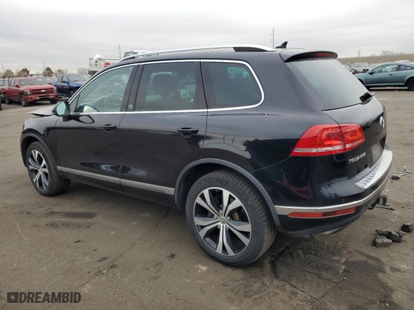 2017 Volkswagen Touareg Wolfsburg Edition with VIN WVGRF7BP9HD006520, listed as a Copart auction lot 84168634 with 76,596 mi miles and Salvage Title. Bid and sale history available at carsss.com. Image 2.