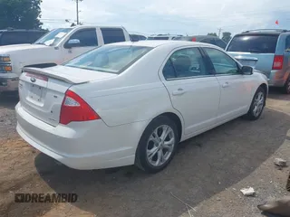 2012 Ford Fusion SE with VIN 3FAHP0HG8CR160797, listed as a IAAI auction lot 42619480 with 106,511 mi miles and . Bid and sale history available at DreamBid. Image 4.