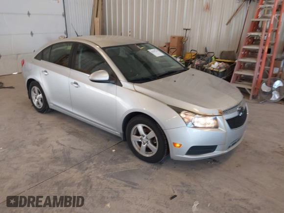 2014 Chevrolet Cruze 1LT with VIN 1G1PC5SB2E7296549, listed as a IAAI auction lot 42797744 with 137,343 mi miles and . Bid and sale history available at DreamBid. Image 1.