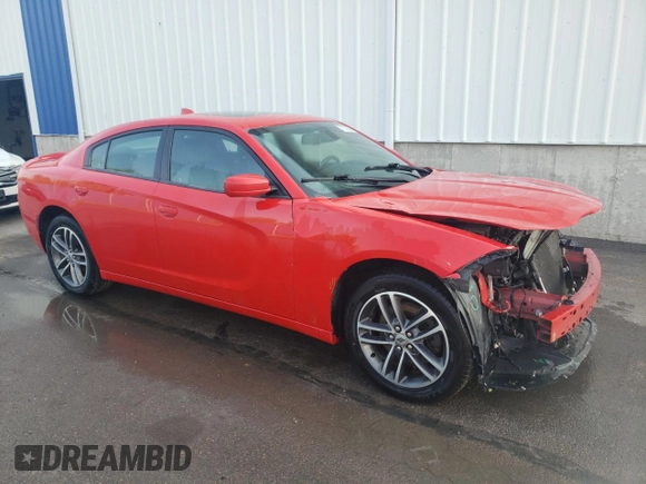 2019 Dodge Charger SXT with VIN 2C3CDXJGXKH611601, listed as a Copart auction lot 71523354 with 133,178 mi miles and Clean Title. Bid and sale history available at DreamBid. Image 4.